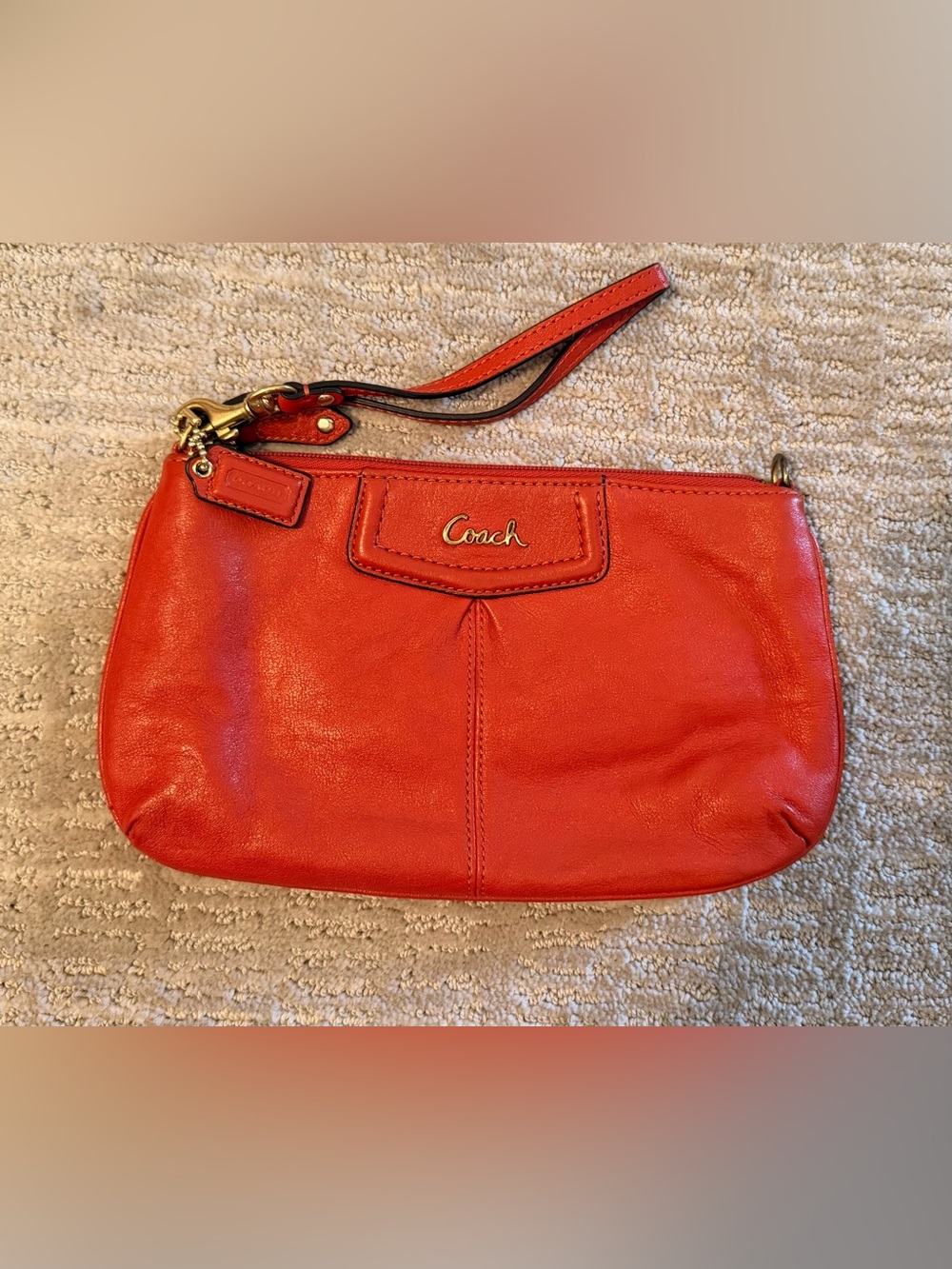 Coach Burnt Orange Leather Wristlet with Gold Hardware